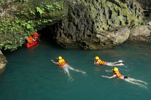 Swim and kayak to get inside Dark cave