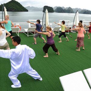 Morning Tai Chi on the cruise, Vietnam local tours
