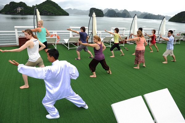 Morning Tai Chi on the cruise, Vietnam local tours