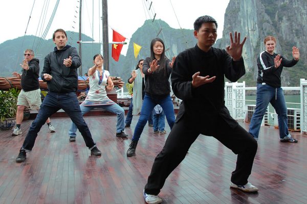 Taichi lesson on cruise, Vietnam tour package