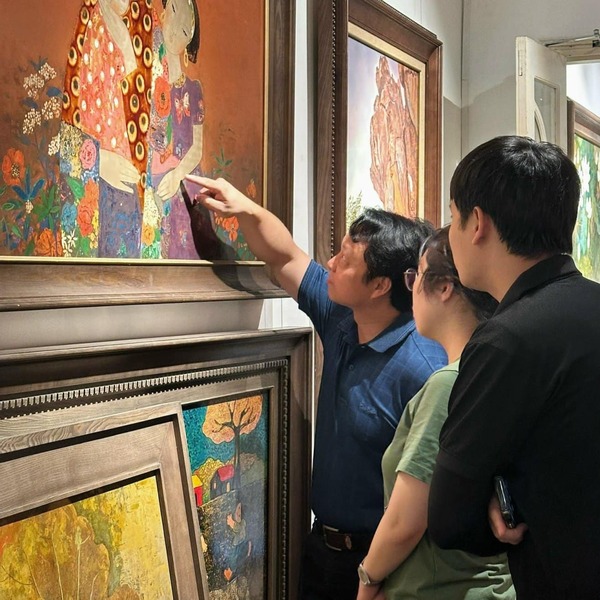 Exhibition room at Nguyen Art Gallery with Vietnamese paintings