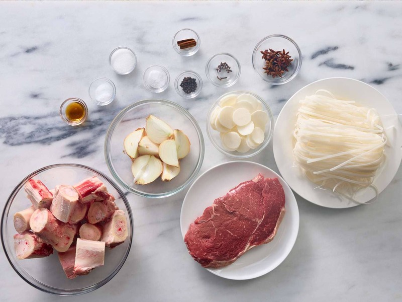 How do you make pho soup with beef slices, rice noodles and herbs
